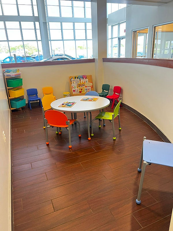 Paul Moak Subaru Service waiting room - kids area with table and chairs